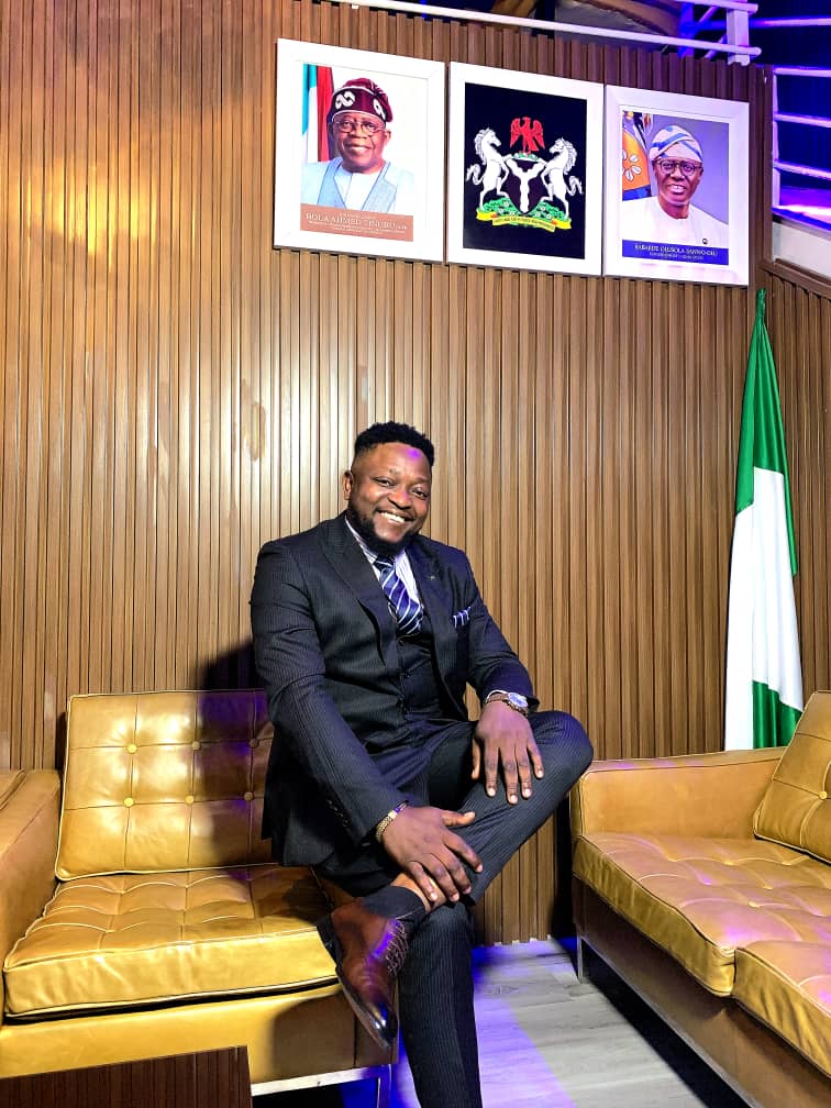 Drtonez seated at the office